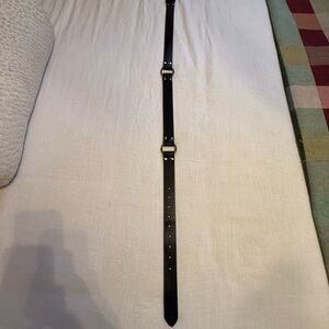 Sleek Black Belt with Gold Accents